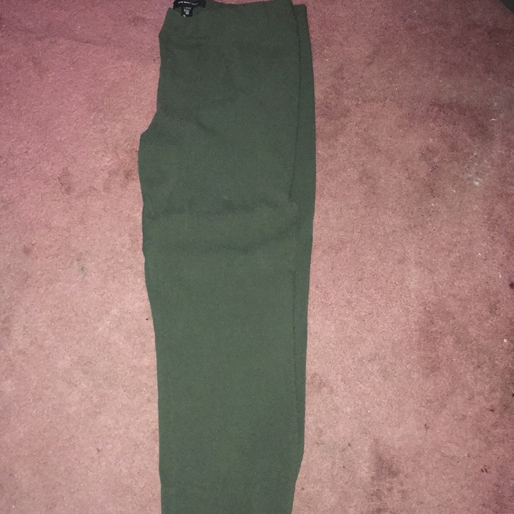 Green skinny leg pants